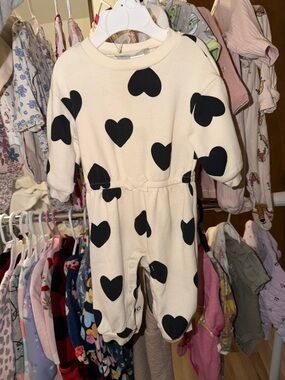 Cream Baby Romper with Black Heart Print